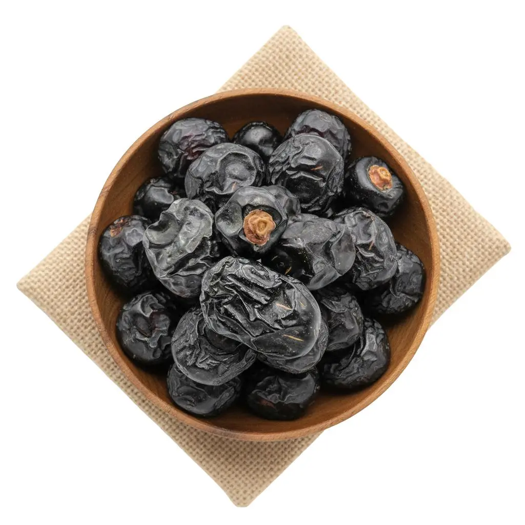 Dark-coloured Ajwa dates, a well-known date variety associated with Madinah, Saudi Arabia.